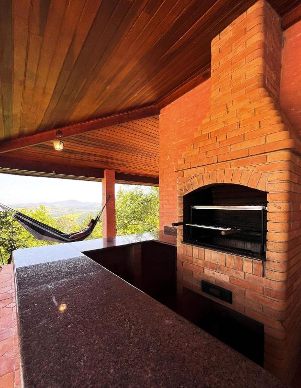 Foto da galeria de Casa de Campo Araxá na montanha com piscina em Piracaia