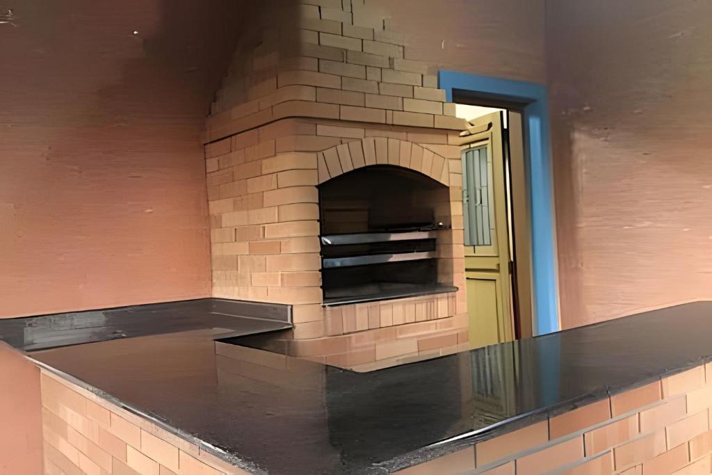Foto da galeria de Casa de Campo Araxá na montanha com piscina em Piracaia