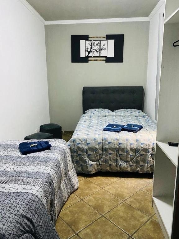 Postel nebo postele na pokoji v ubytování Hostel ANPRADO 5