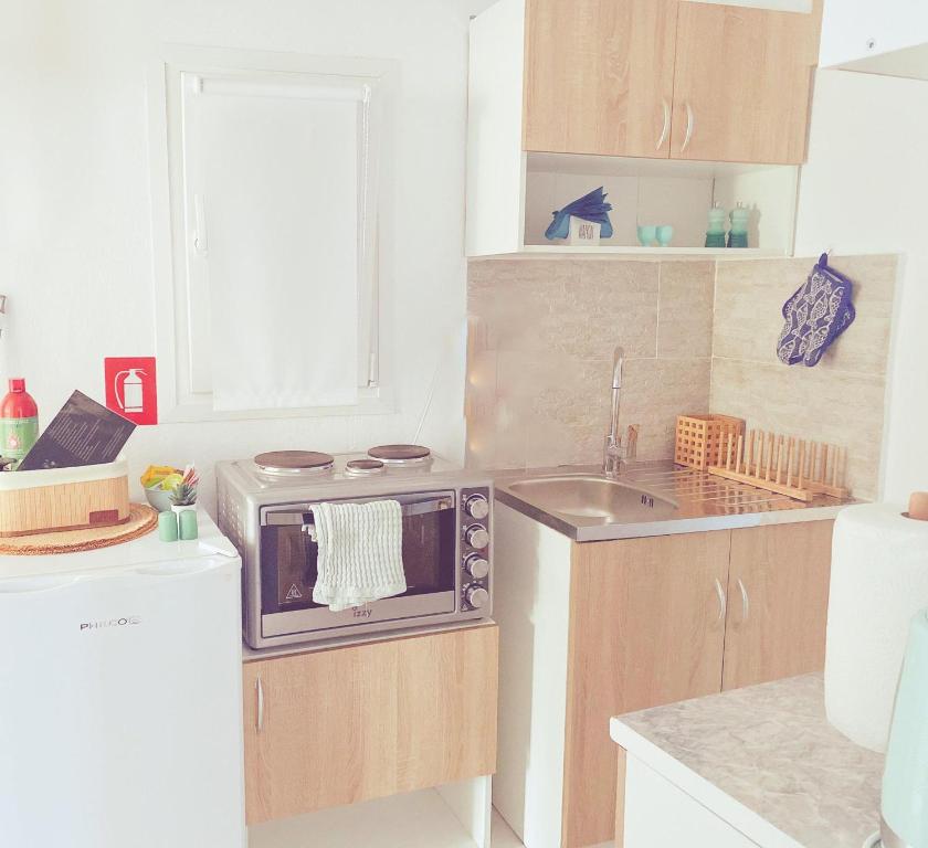 Køkken eller tekøkken på Naira Family Suites Mykonos