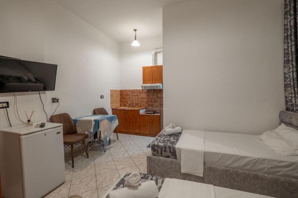 Postel nebo postele na pokoji v ubytování Hotel Vila Vilson