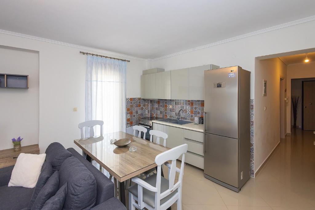 Kuchyň nebo kuchyňský kout v ubytování Kallikratia Suites 3