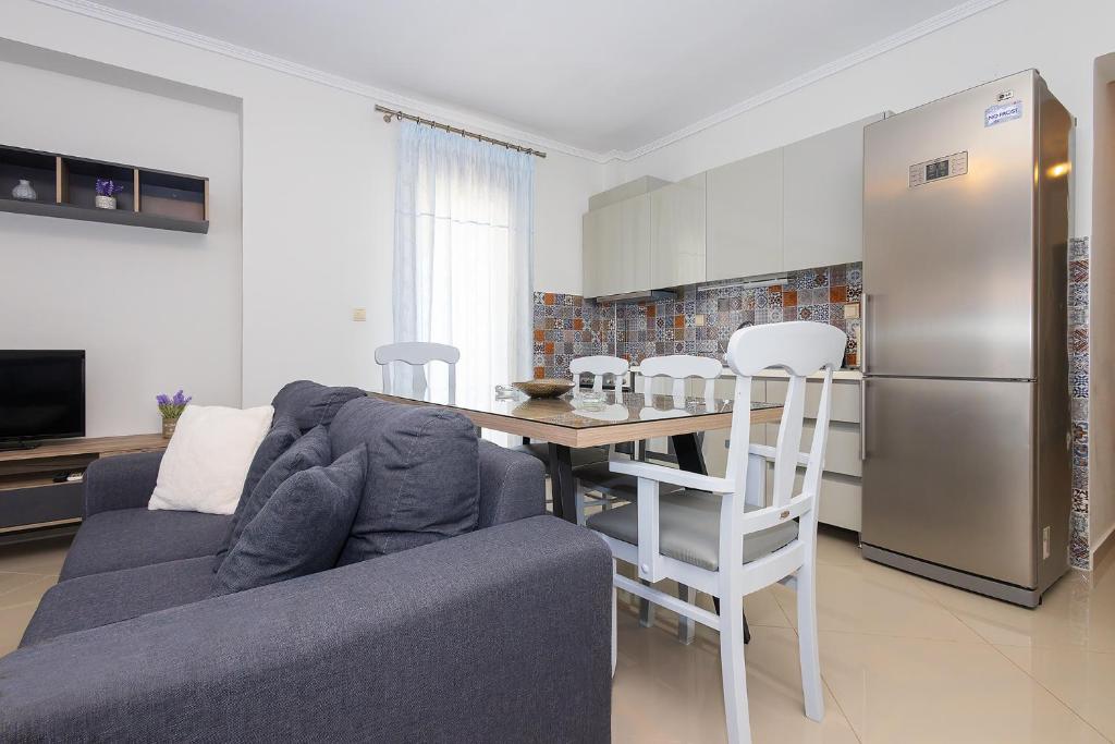 Kuchyň nebo kuchyňský kout v ubytování Kallikratia Suites 3