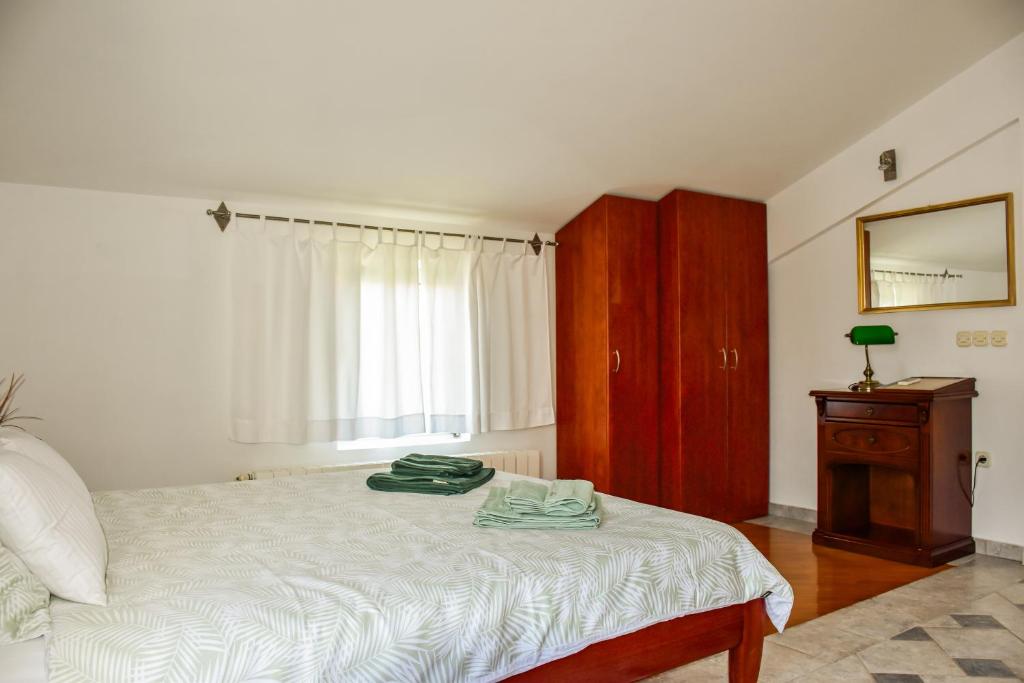 Posteľ alebo postele v izbe v ubytovaní Apartment Zanic
