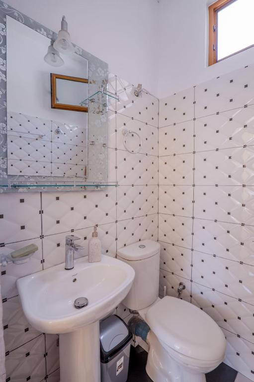 Koupelna v ubytování Hotel Vila Vilson