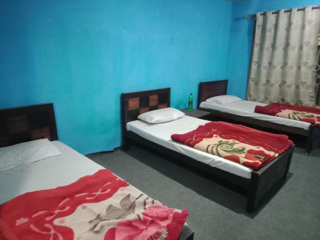 Paradise travels and tours - Habitación Triple