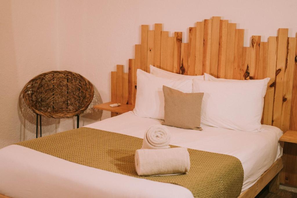 Cama ou camas em um quarto em Enigmatic Hotel Experience