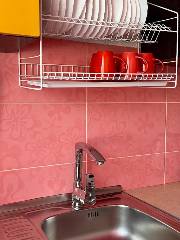 Kuchyň nebo kuchyňský kout v ubytování DONE KANDYBONE Apartments