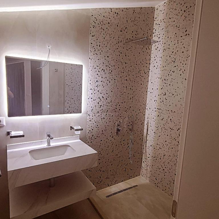 Koupelna v ubytování Hotel Noel