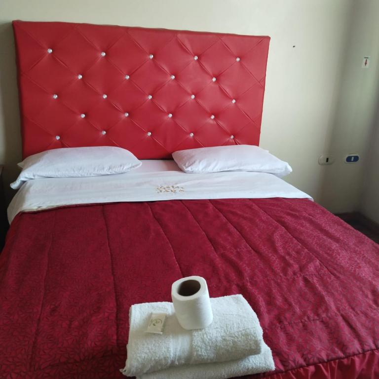 Postel nebo postele na pokoji v ubytování Hostal Jara