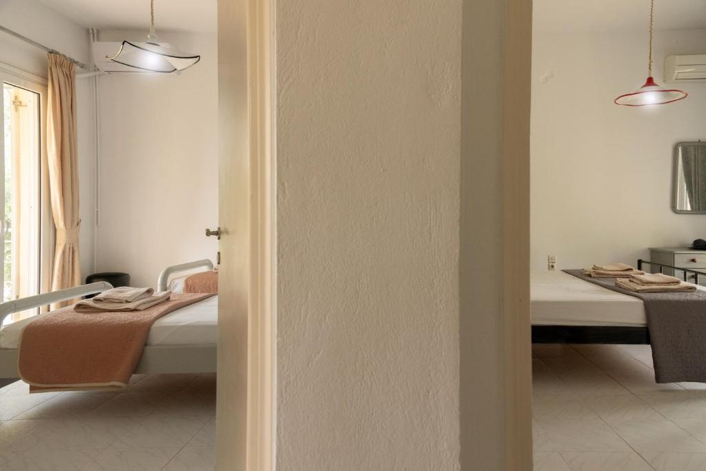 A bed or beds in a room at MEL