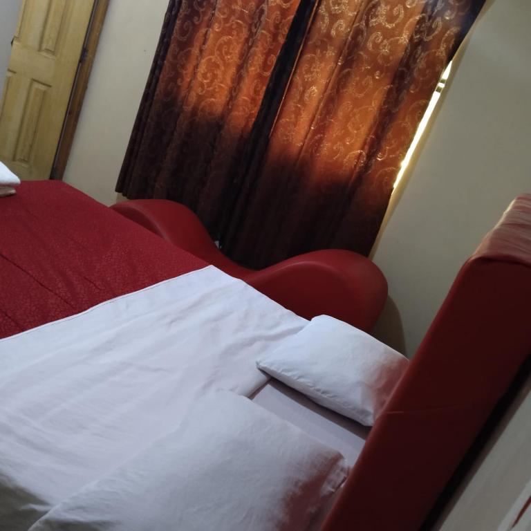 Postel nebo postele na pokoji v ubytování Hostal Jara