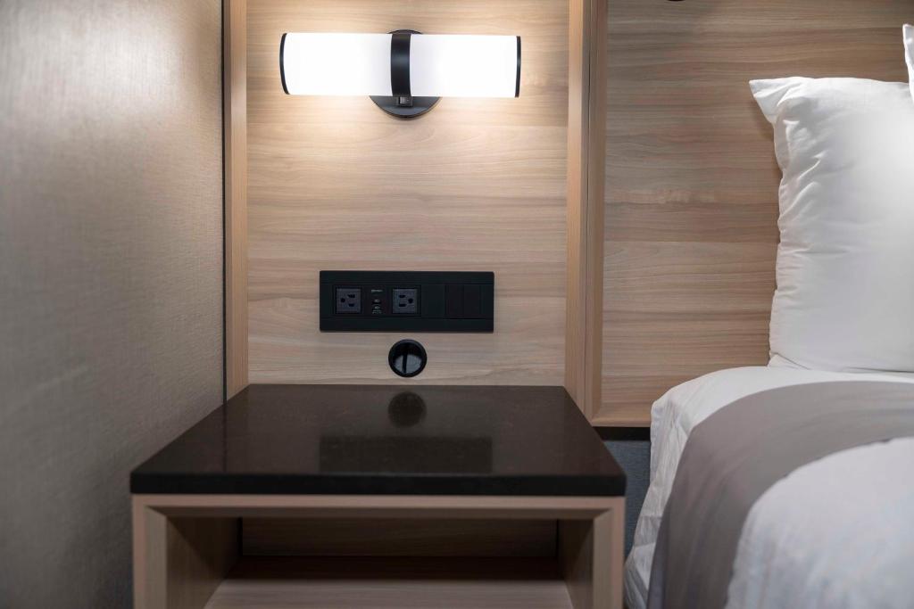 Postel nebo postele na pokoji v ubytování Accent Inns Victoria