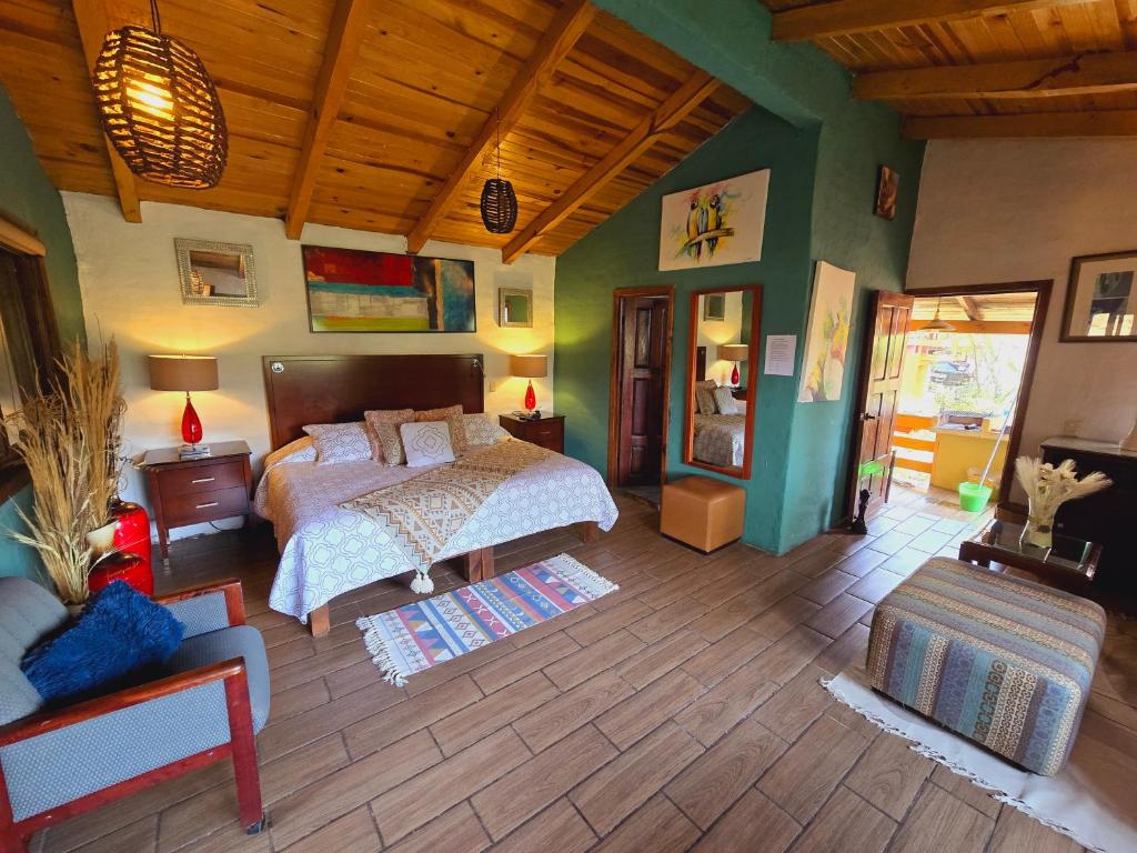 Postel nebo postele na pokoji v ubytování Villas De Los Pinos 2