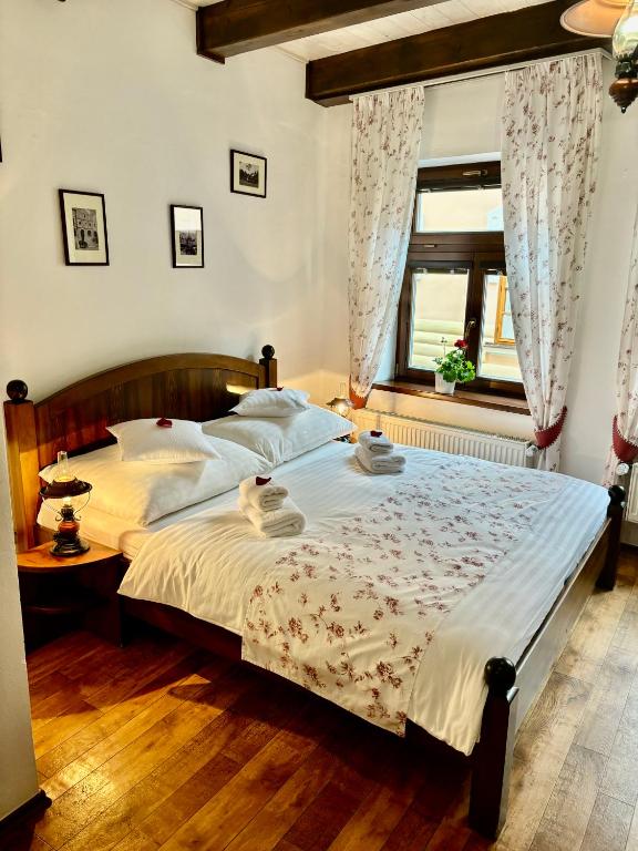 Postel nebo postele na pokoji v ubytování Penzion Pohádka