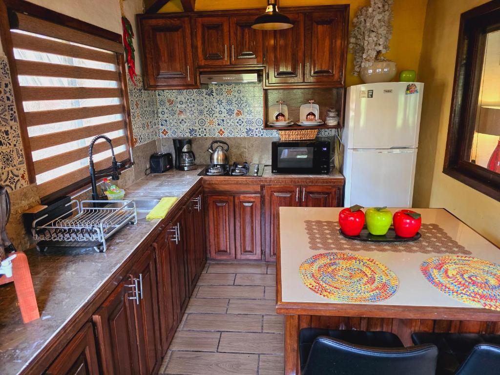 Kuchyň nebo kuchyňský kout v ubytování Villas De Los Pinos 2
