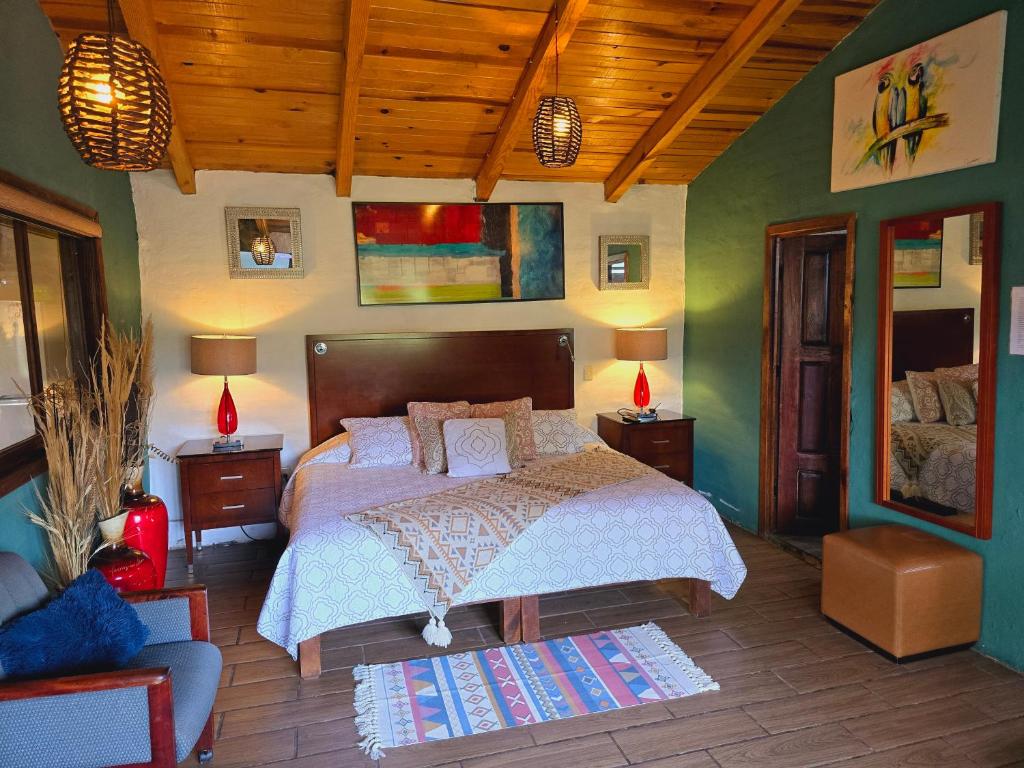Postel nebo postele na pokoji v ubytování Villas De Los Pinos 2