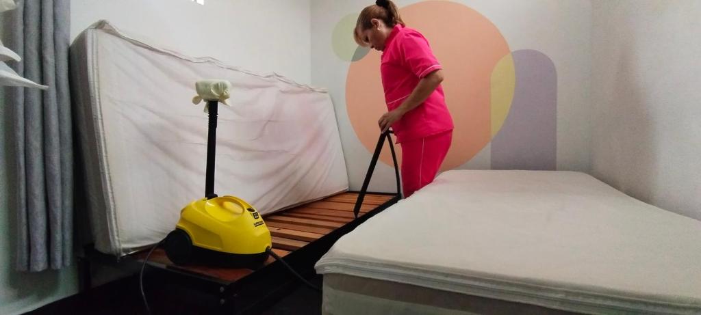 Postel nebo postele na pokoji v ubytování Hostel Metro Floresta Alojamiento