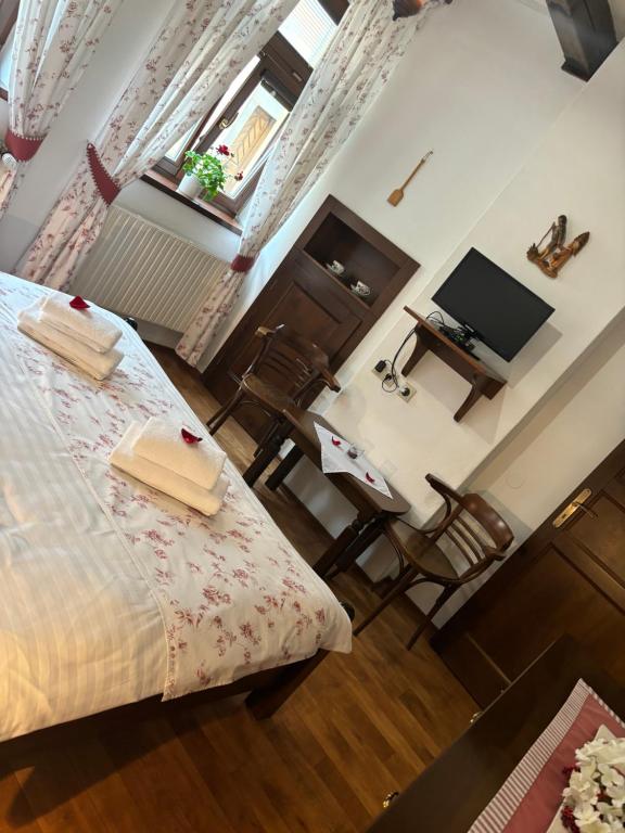 Postel nebo postele na pokoji v ubytování Penzion Pohádka