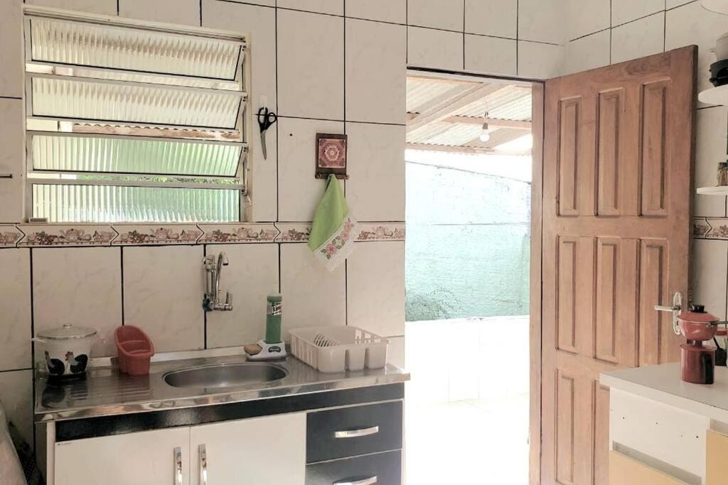 Kuchyň nebo kuchyňský kout v ubytování CASA DA PRAÇA Ibicoara - a melhor hospedagem