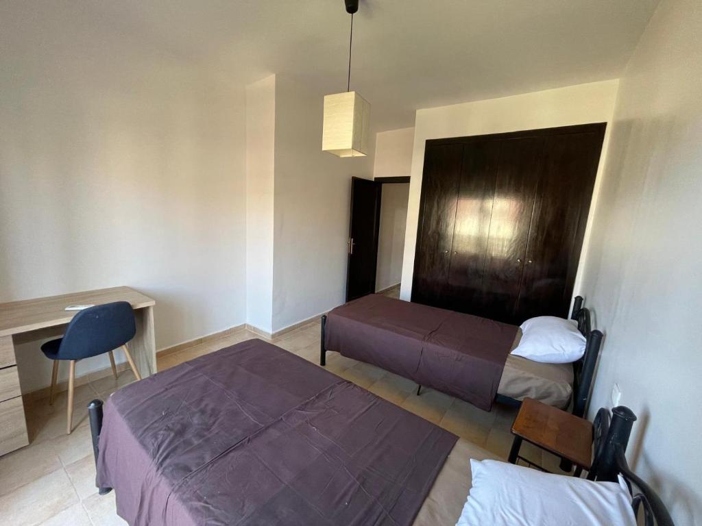 Marina Ap2客房内的一张或多张床位