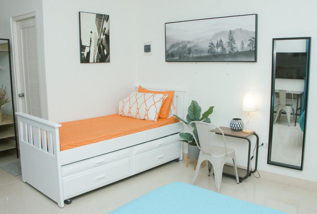 Postel nebo postele na pokoji v ubytování Amar Residence