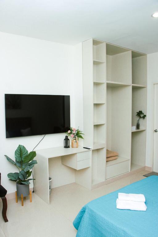 TV a/nebo společenská místnost v ubytování Amar Residence