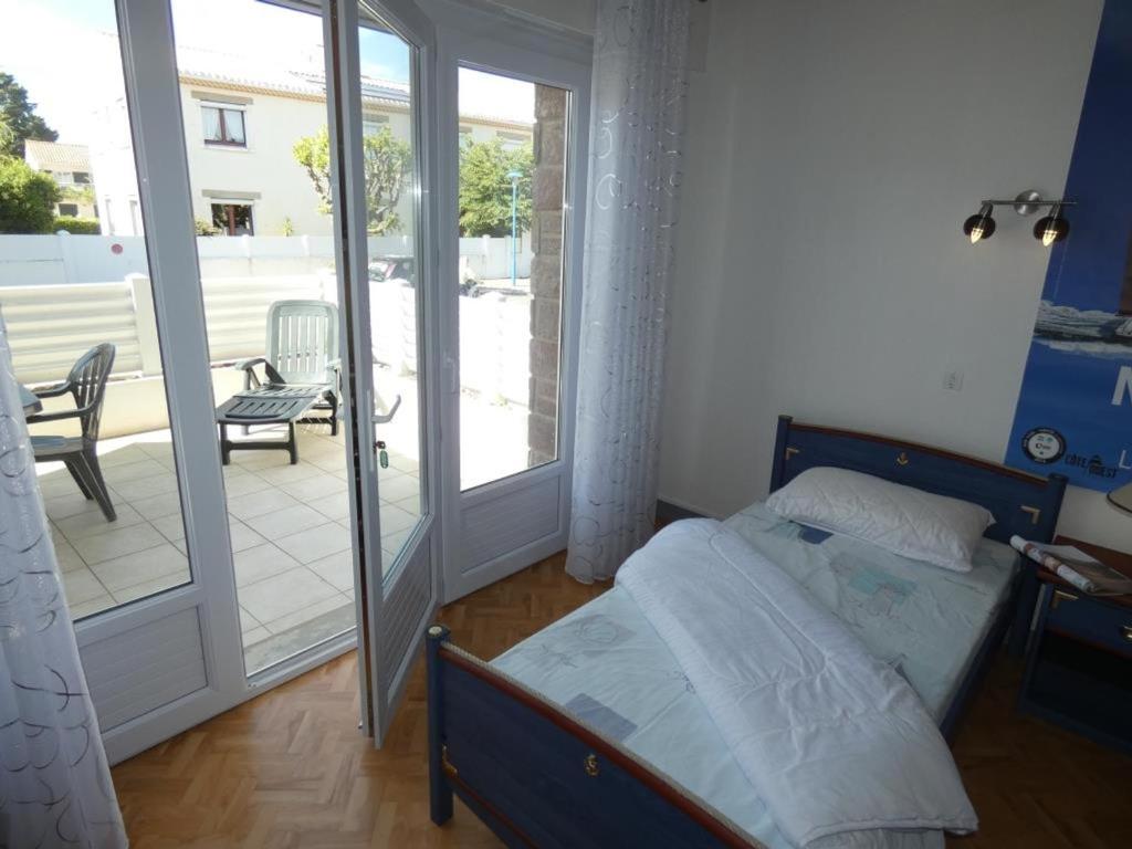 Posteľ alebo postele v izbe v ubytovaní Appartement 4 pers, terrasse, proche plage/commerces - Notre-Dame-de-Monts - FR-1-540-190