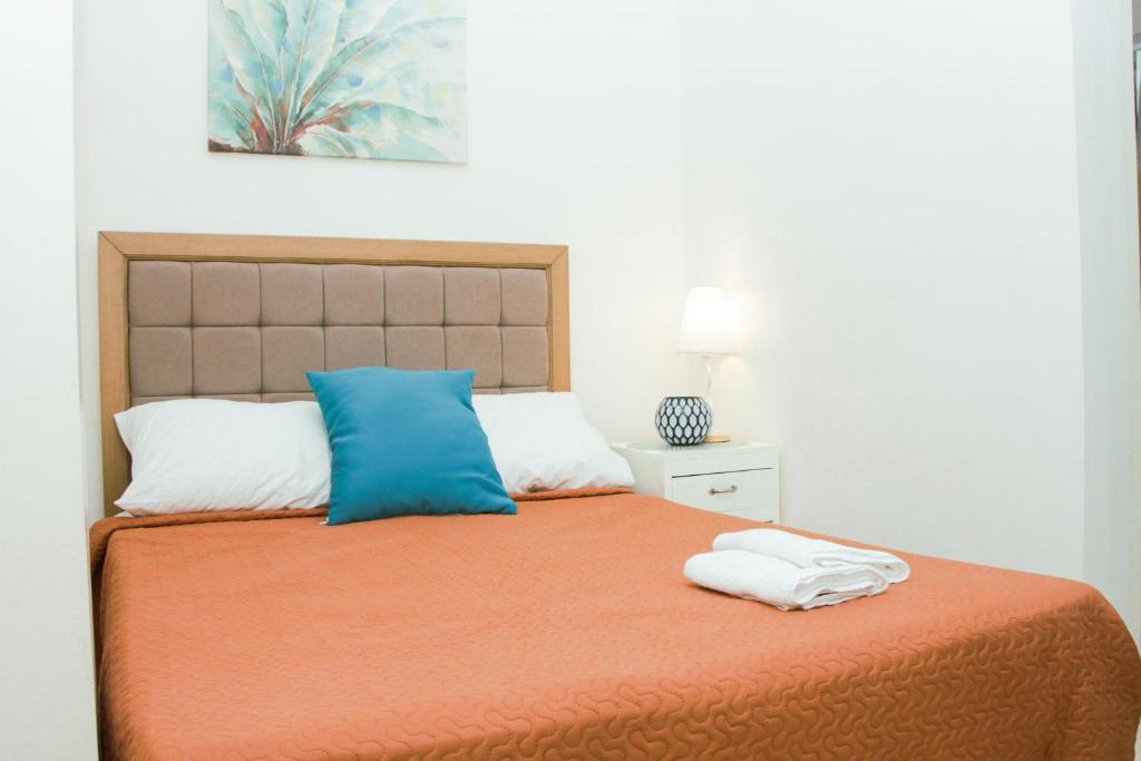 Postel nebo postele na pokoji v ubytování Amar Residence