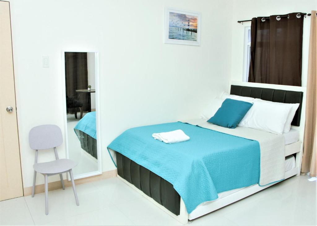 Postel nebo postele na pokoji v ubytování Amar Residence