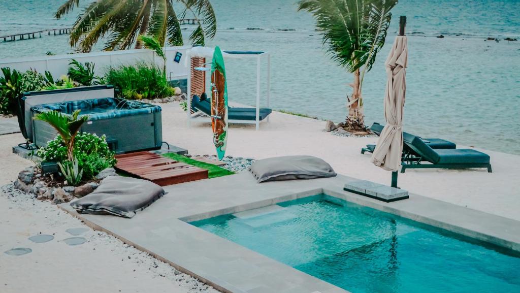 Bazén v ubytování Pension Irivai, Appartement RAVA 1 chambre bord de mer nebo v jeho okolí