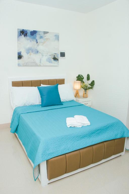 Postel nebo postele na pokoji v ubytování Amar Residence