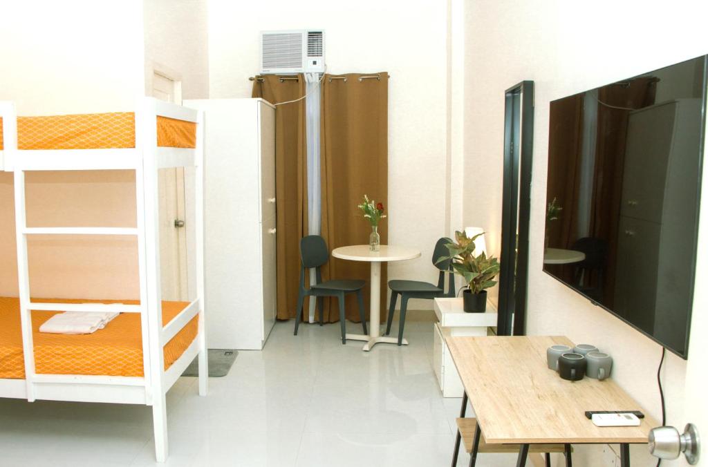 TV a/nebo společenská místnost v ubytování Amar Residence