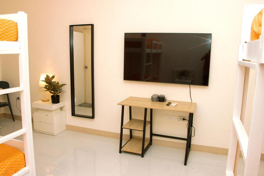 TV a/nebo společenská místnost v ubytování Amar Residence