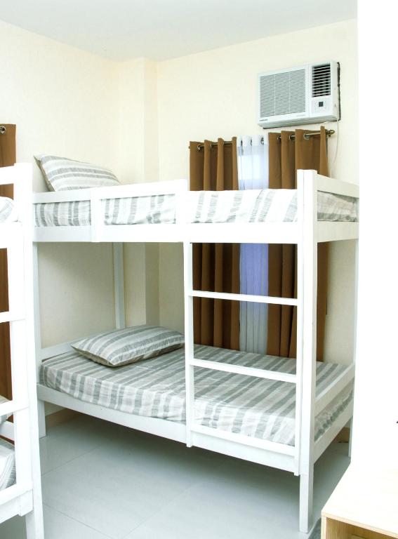 Postel nebo postele na pokoji v ubytování Amar Residence