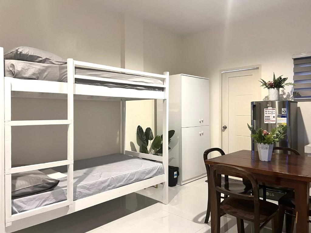 Postel nebo postele na pokoji v ubytování Amar Residence