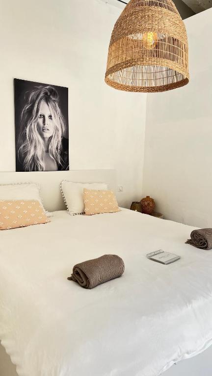 Posteľ alebo postele v izbe v ubytovaní B&B Maison Gigi