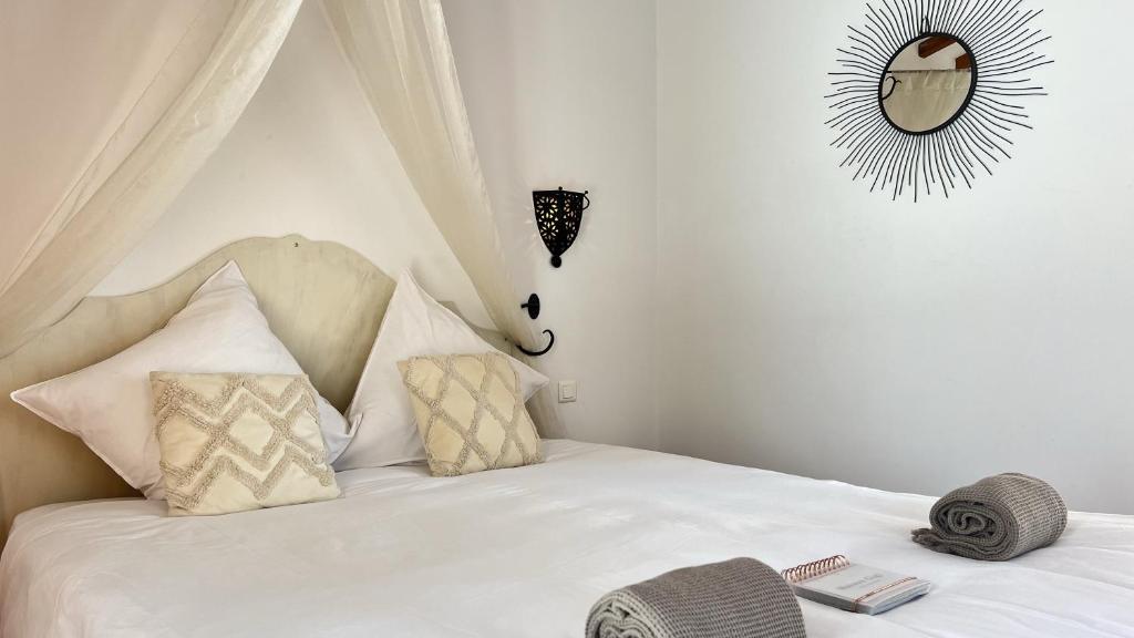 Posteľ alebo postele v izbe v ubytovaní B&B Maison Gigi