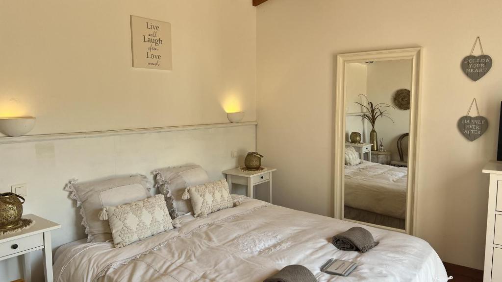 Posteľ alebo postele v izbe v ubytovaní B&B Maison Gigi