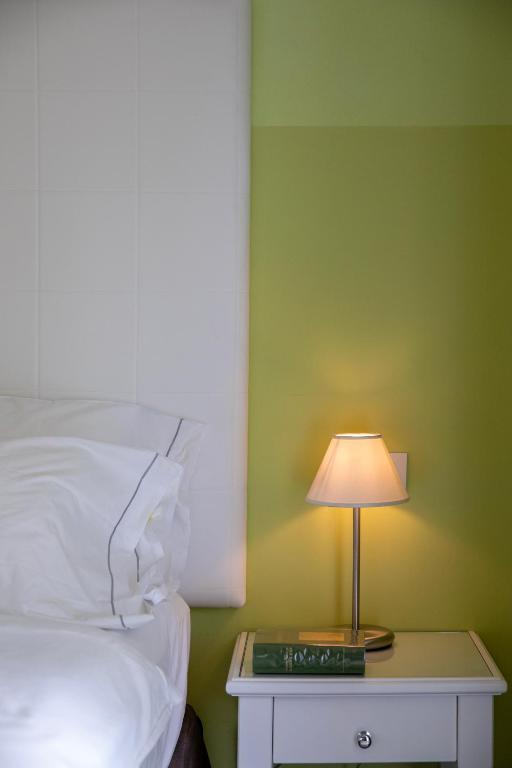 Postel nebo postele na pokoji v ubytování Palace Hotel San Pietro