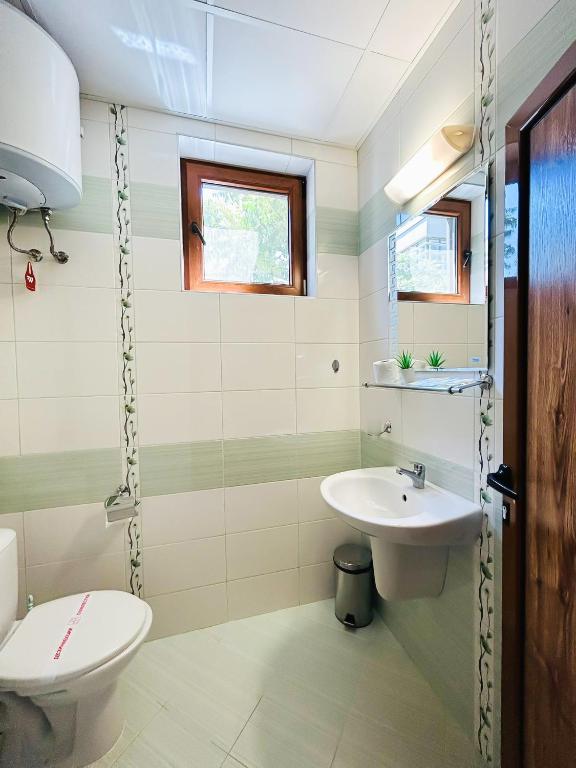 Koupelna v ubytování Family Hotel Helios