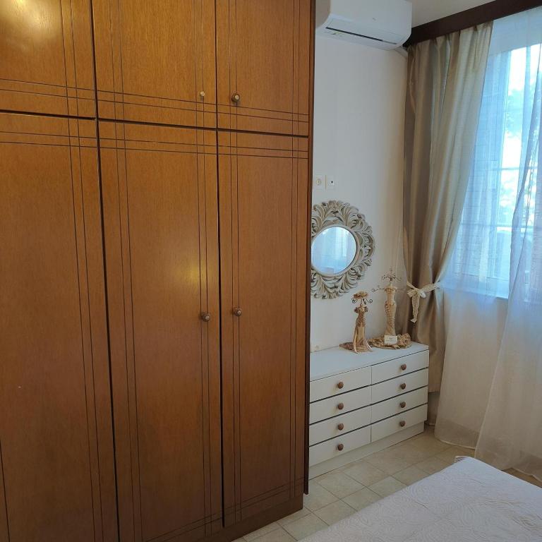 Postel nebo postele na pokoji v ubytování Laurel LK Apt in Kremasti near Airport Rhodes