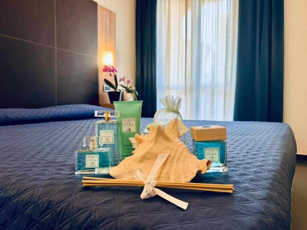 Postel nebo postele na pokoji v ubytování Hotel Fontalleccio