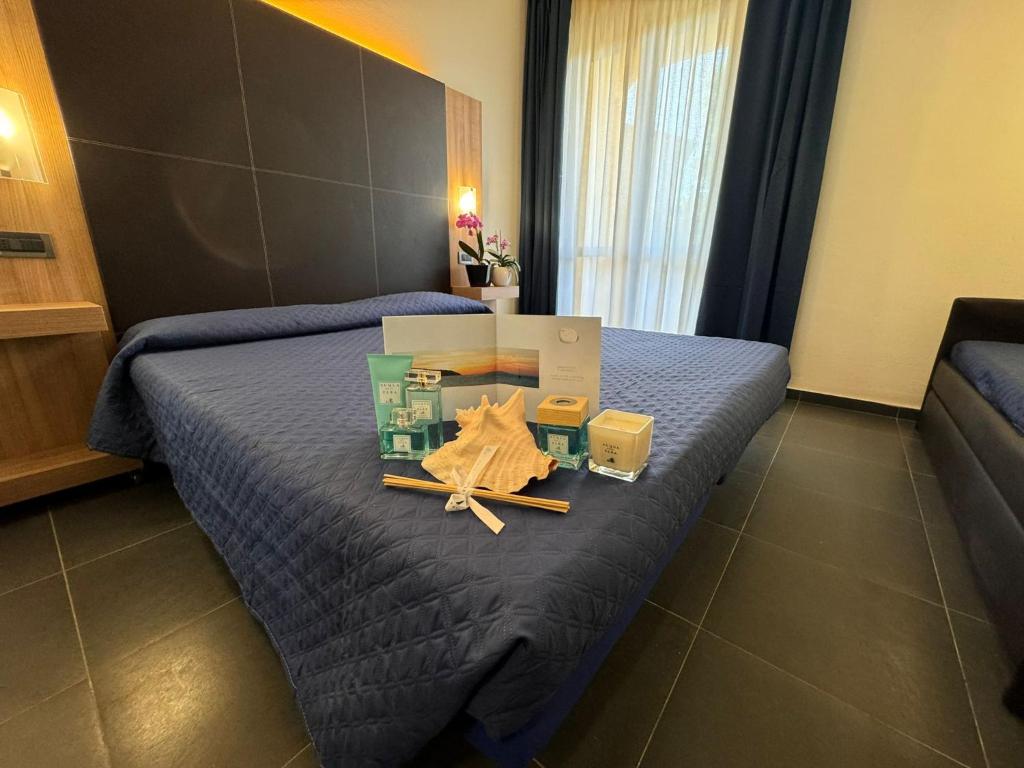 Postel nebo postele na pokoji v ubytování Hotel Fontalleccio