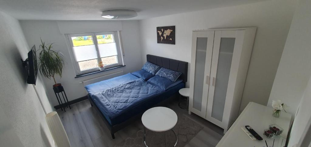 Postel nebo postele na pokoji v ubytování Kleine gemütliche Wohnung