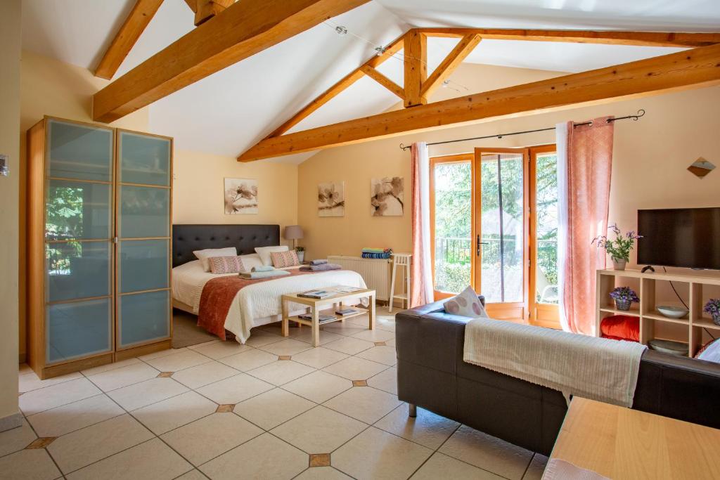 Postel nebo postele na pokoji v ubytování Gites du Caylar - Chambres et Appartments