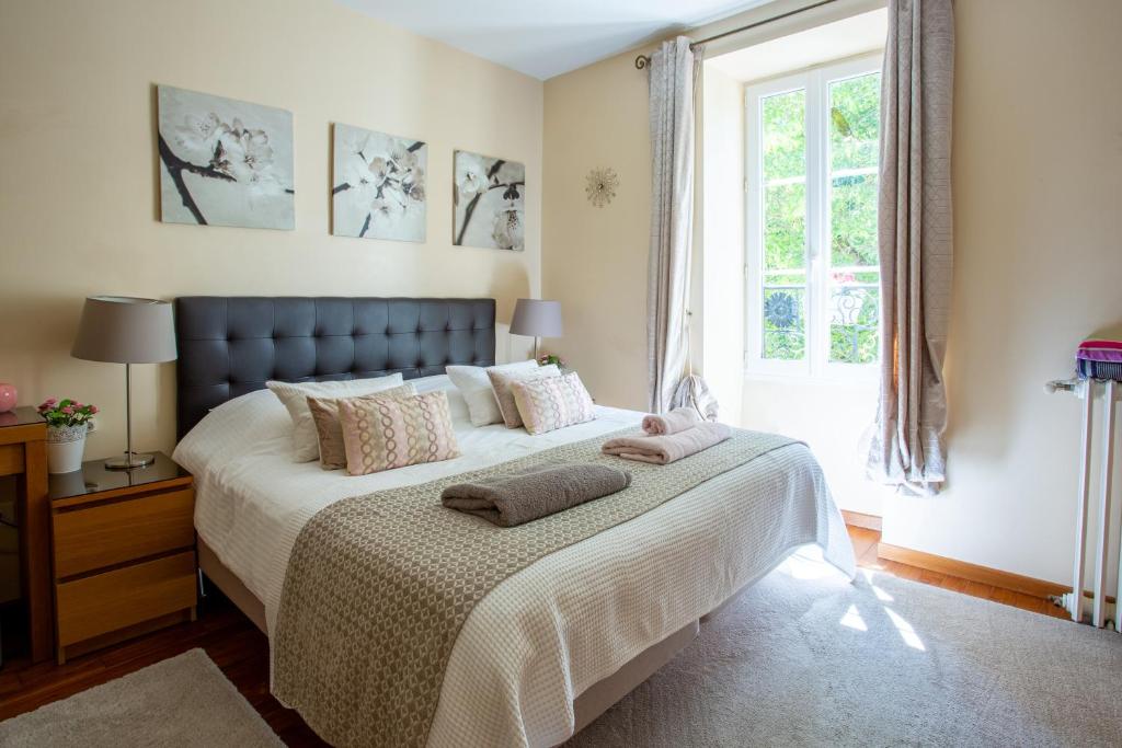 Postel nebo postele na pokoji v ubytování Gites du Caylar - Chambres et Appartments