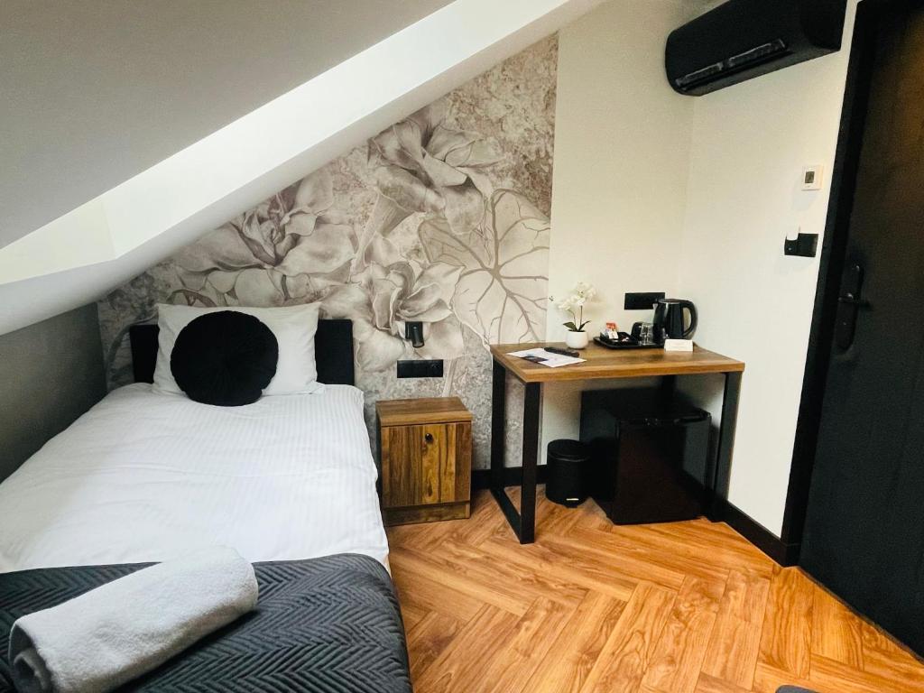 Posteľ alebo postele v izbe v ubytovaní Hotel Millennium