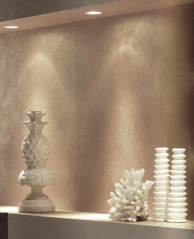 a shelf with a statue of a pineapple and a pile of plates at Csiki Hotel in Miercurea-Ciuc