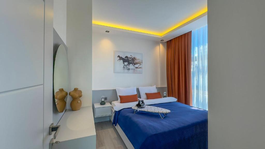 Postel nebo postele na pokoji v ubytování Ulu Panorama Residence
